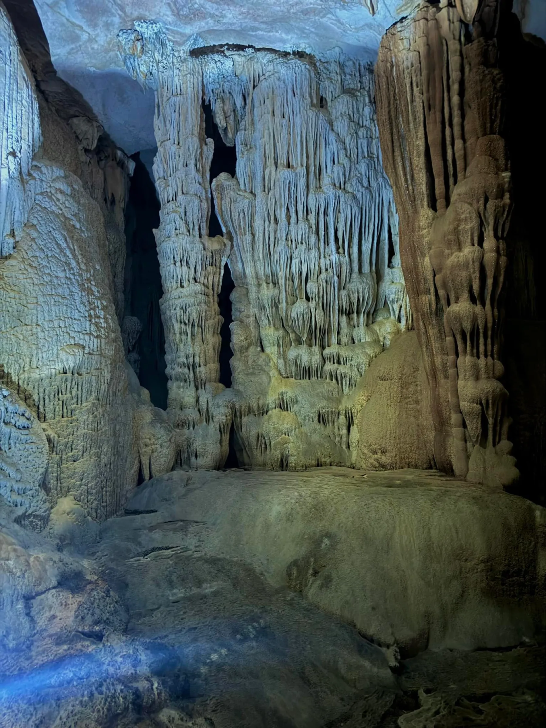 Stalactites and pearl-like rock formations inside Long Coc Cave.
